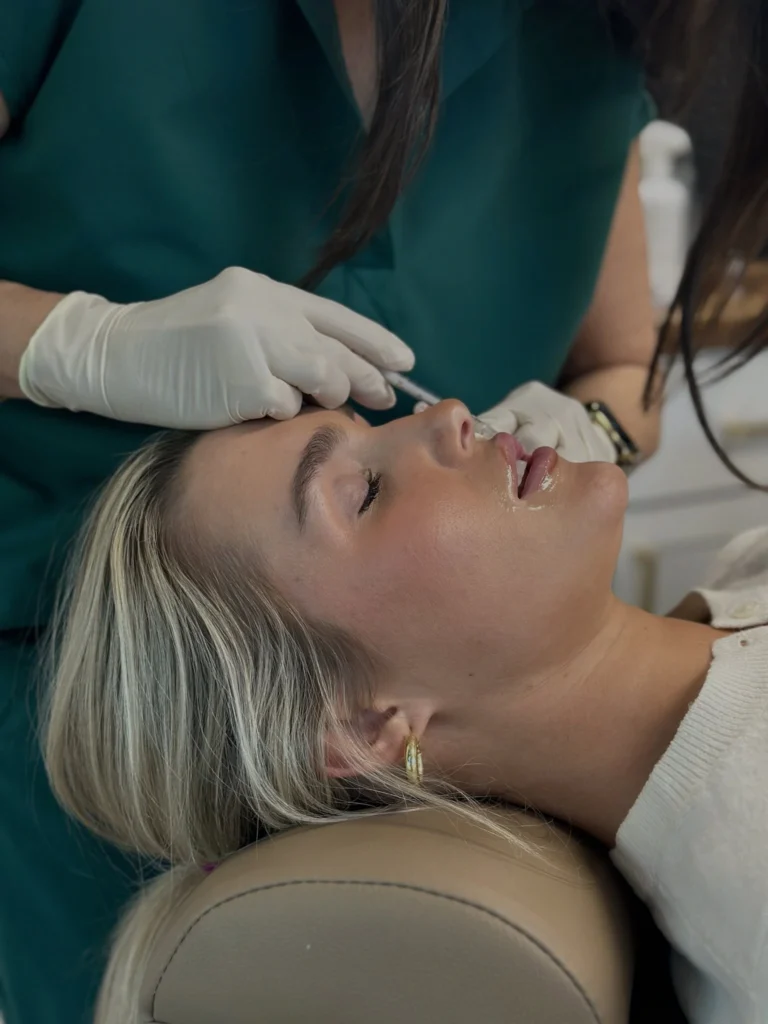 Lip filler injection treatment performed by an aesthetic provider for natural lip enhancement at medical spa